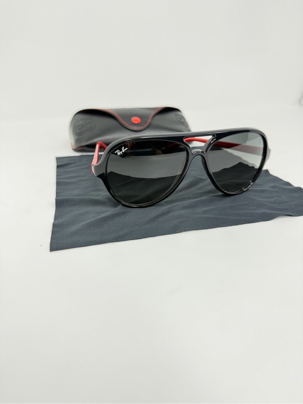 Ray-Ban Black Sunglasses with Red Temple Accents